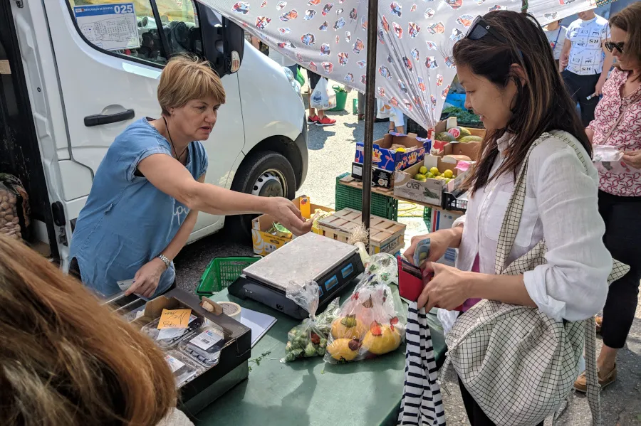 Aside from eating local produce and seafood, Sha-Mayn whips up Asian dishes like bak kut teh on board S/V Kaya. Tobi is seen here eating a version with Spanish pork ribs.