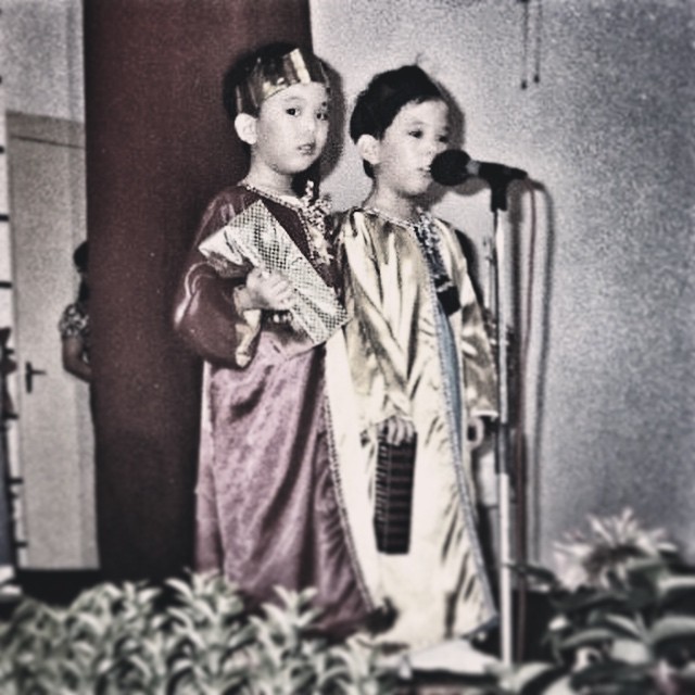 David performing alongside his twin brother at a kindergarten show