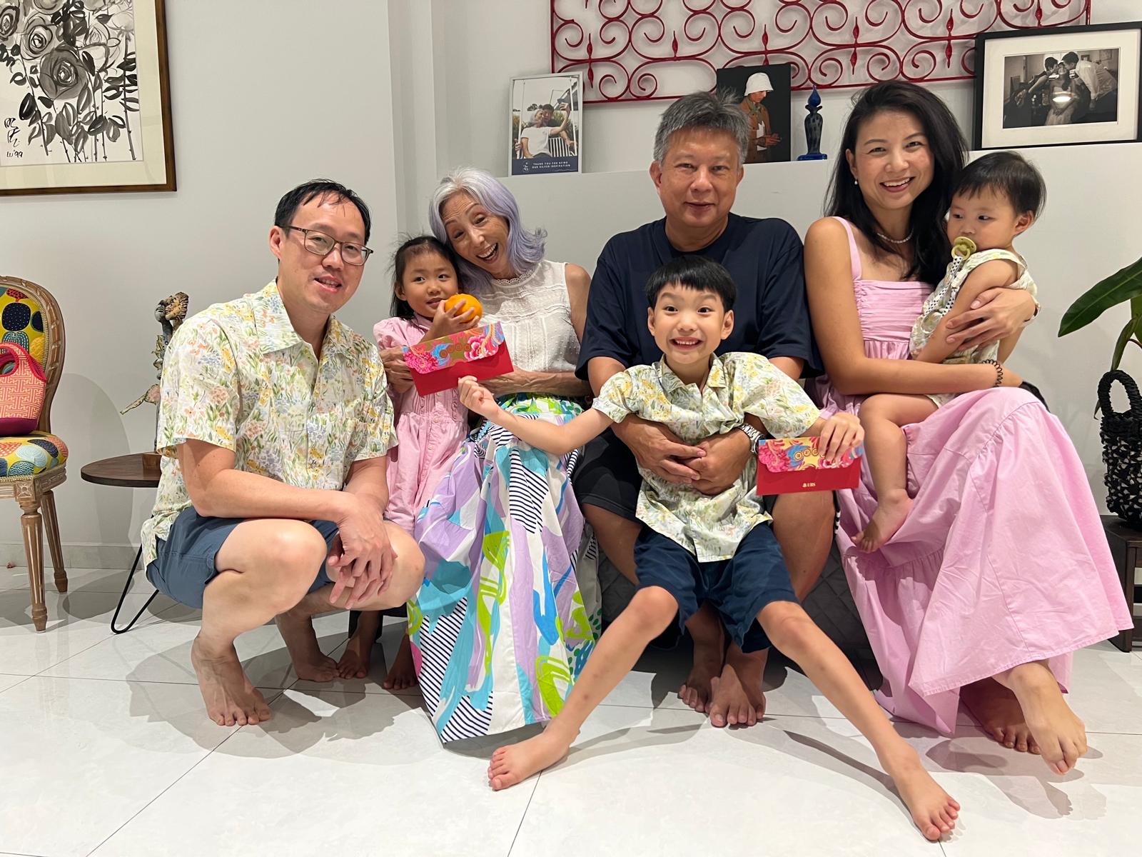 Yan photographed alongside her family.