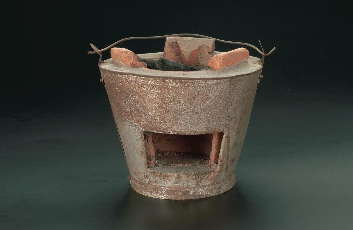 Vintage clay charcoal stove, commonly used by hawkers to cook char kway teow (fried noodles) Photo credit: Roots.sg