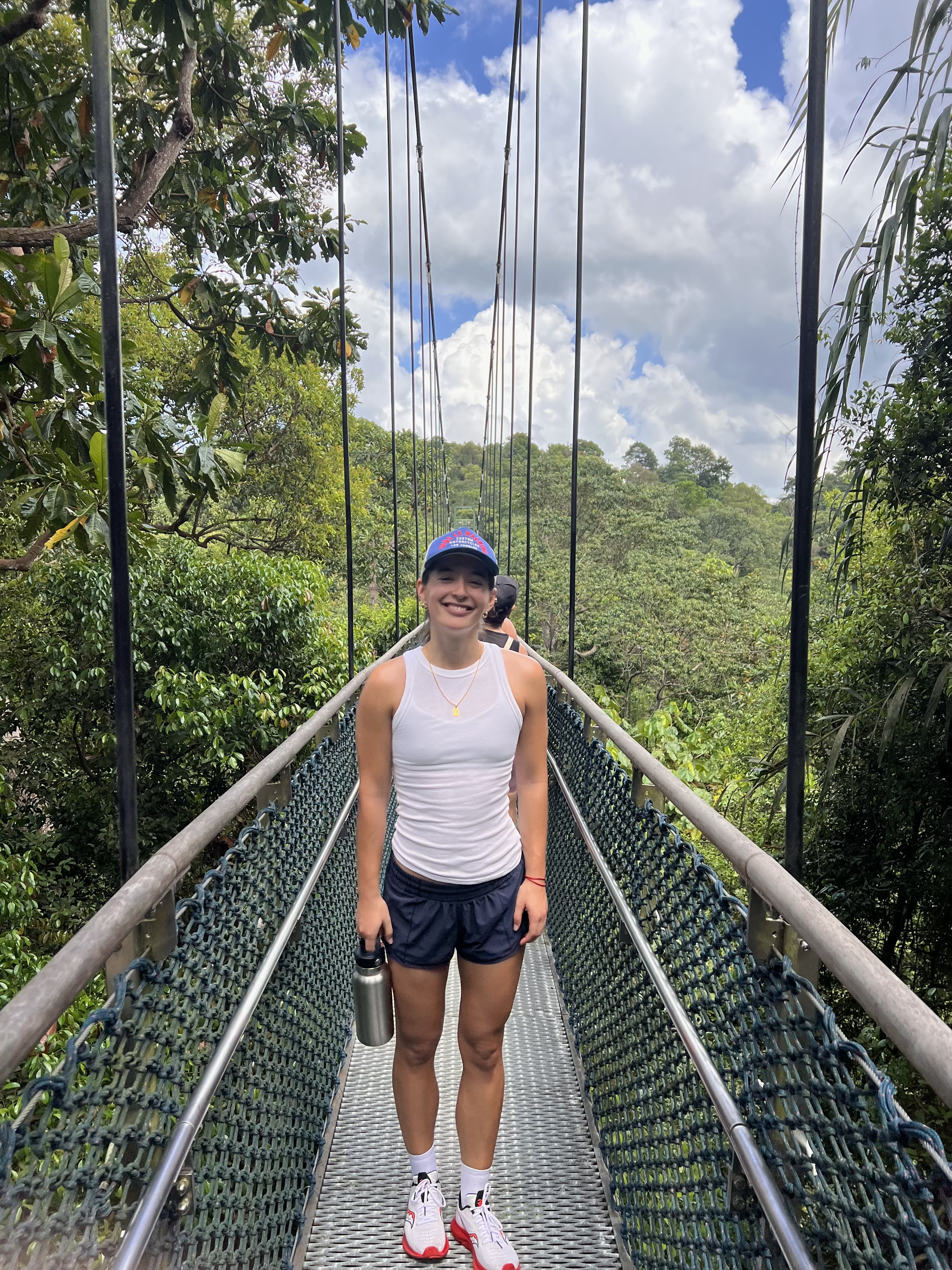 Calista exploring MacRitchie Treetop Walk soon after returning to Singapore.