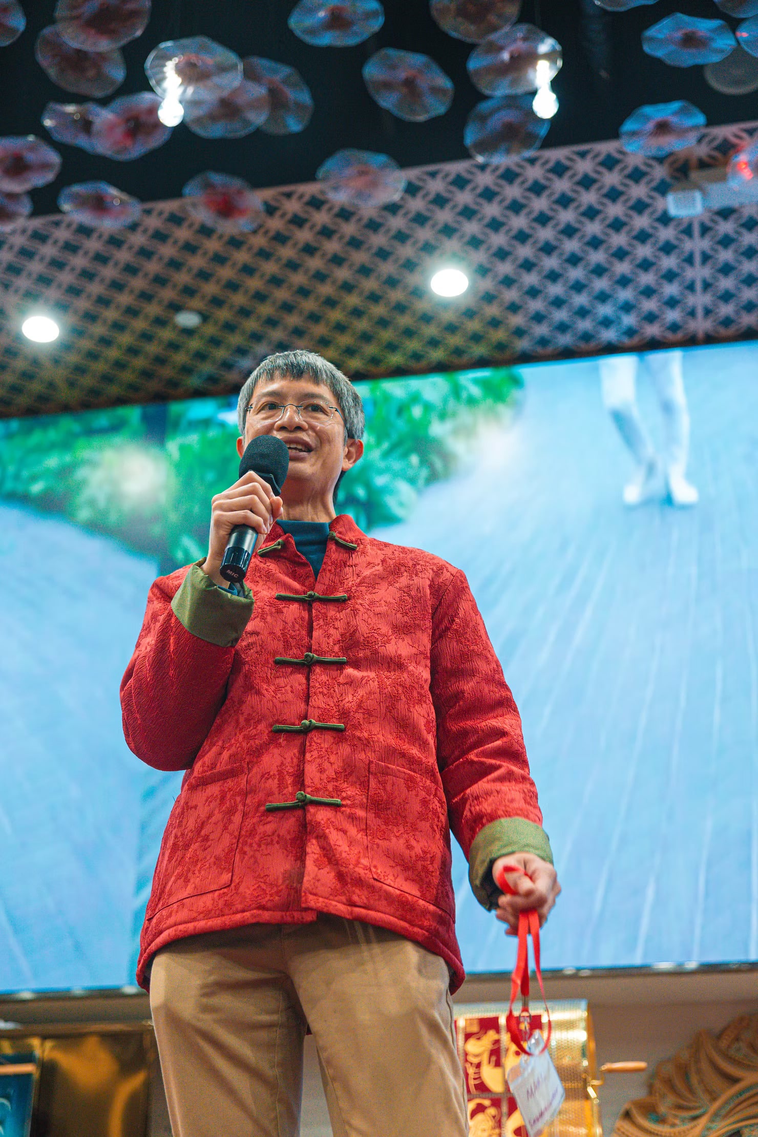 Mark speaking at a SingaporeConnect Lunar New Year event he organised.