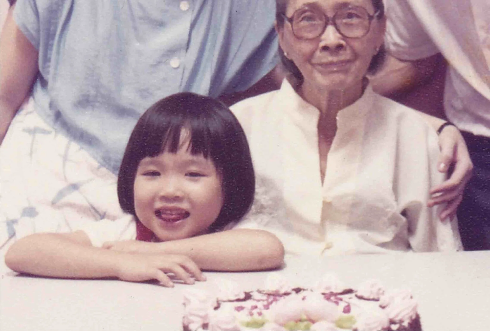An infant Joanna and her lau ma pictured together.