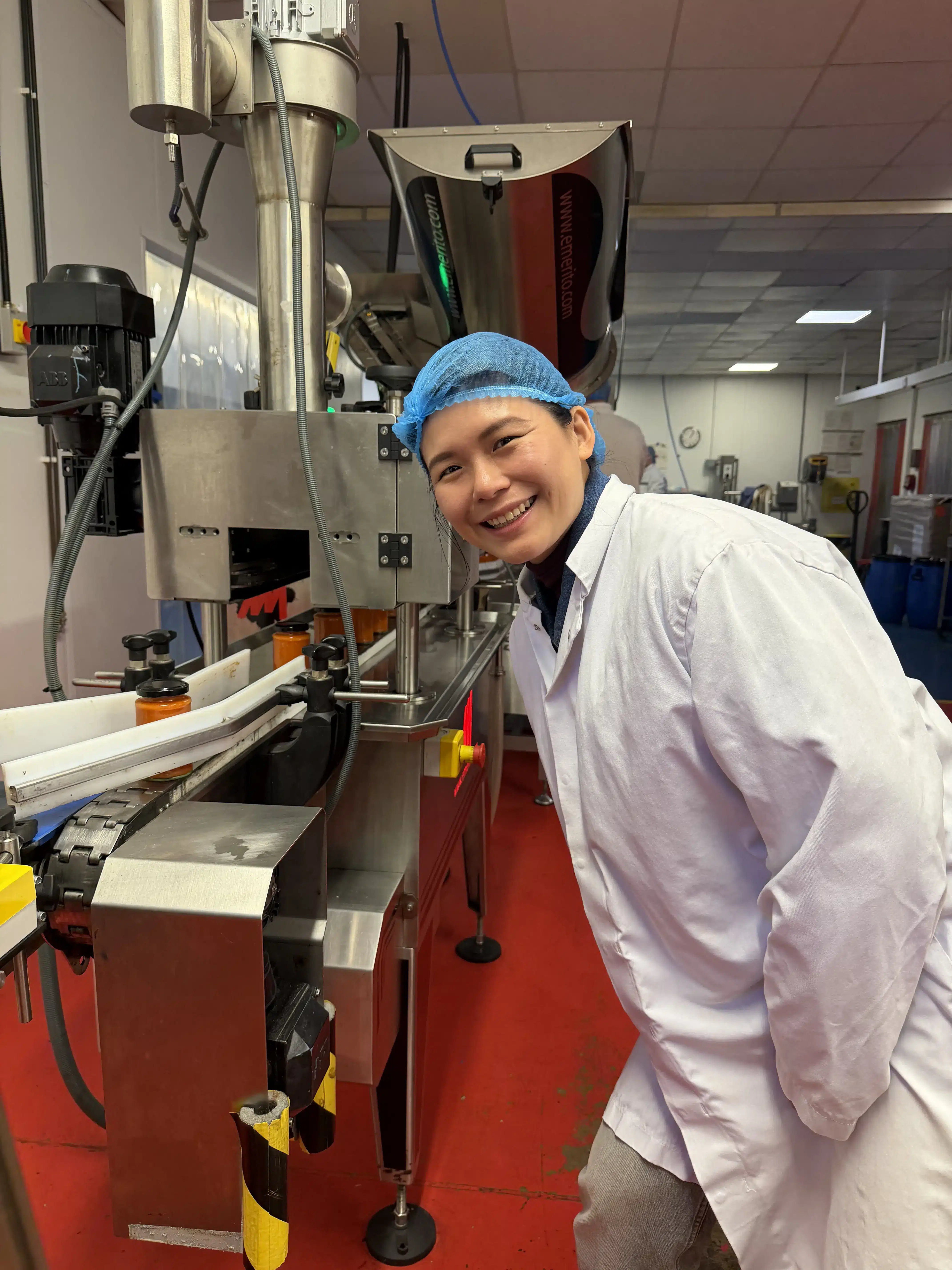 Megan at her factory in the UK, attending the production of Yumm Singa's Signature Ginger Chilli.
