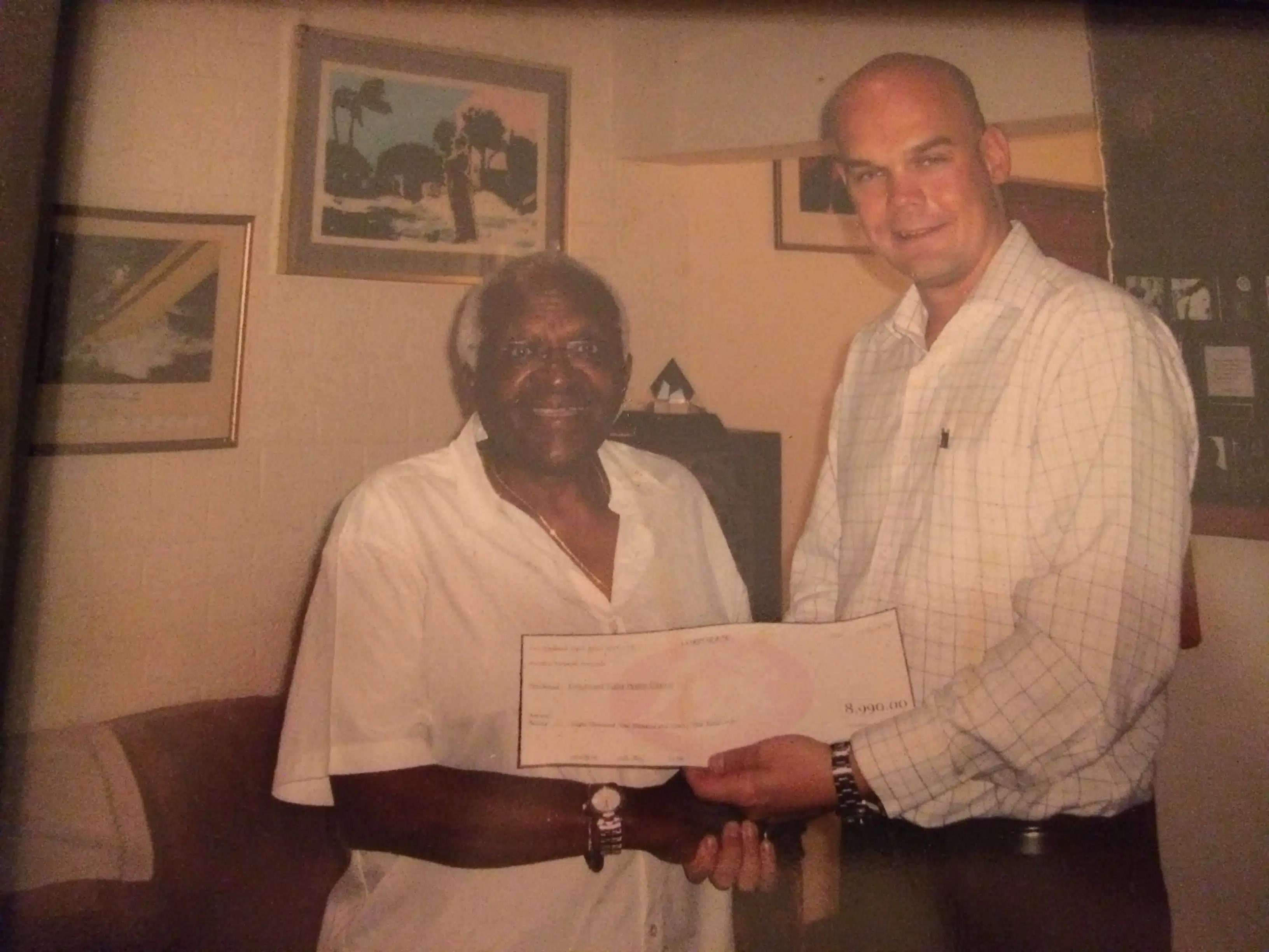 Pierre after successfully selling a vacuum cleaner to Nobel Peace Prize winner Desmond Tutu in South Africa.