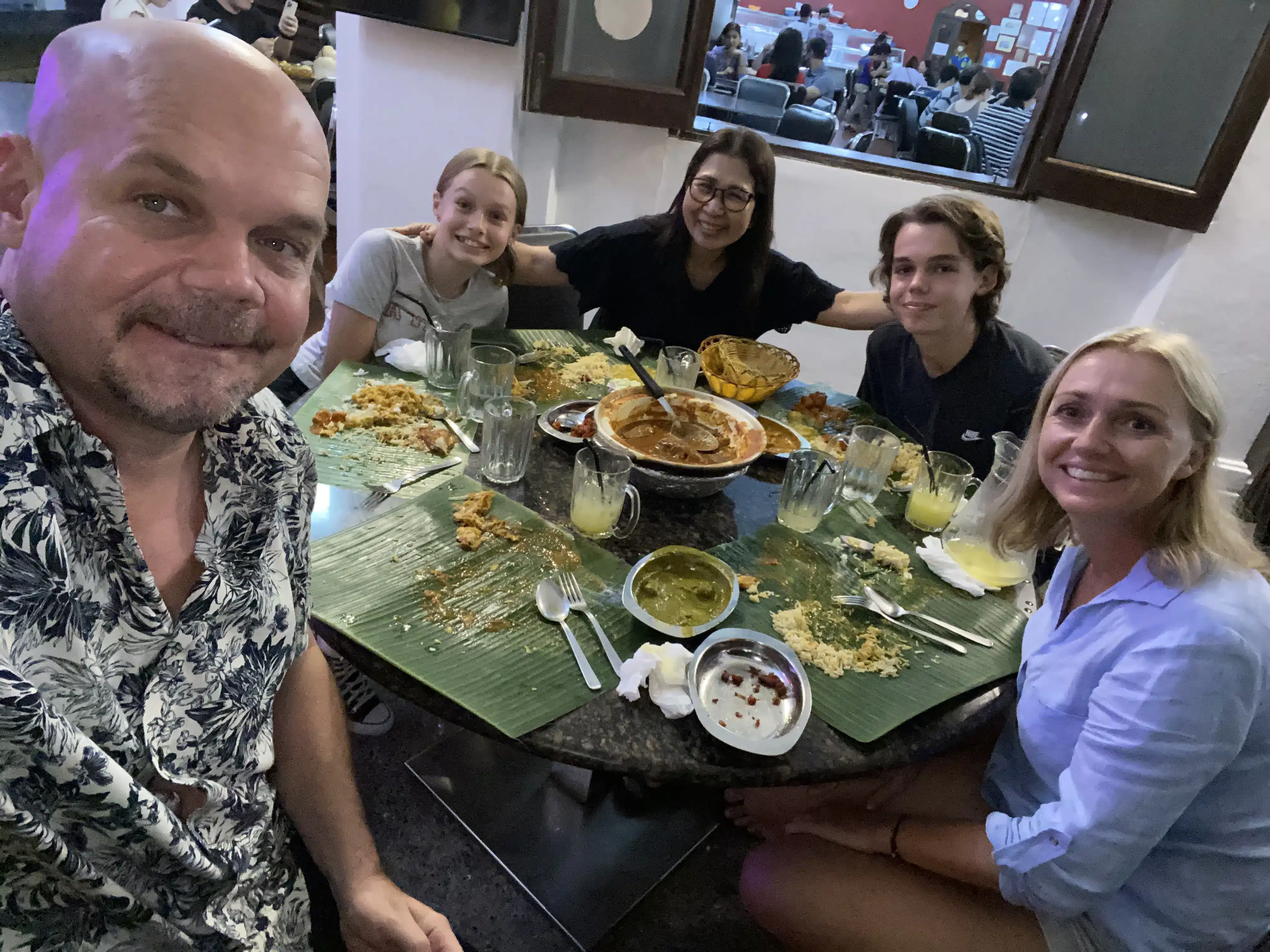 Pierre with his family at Samy’s Curry in Dempsey.