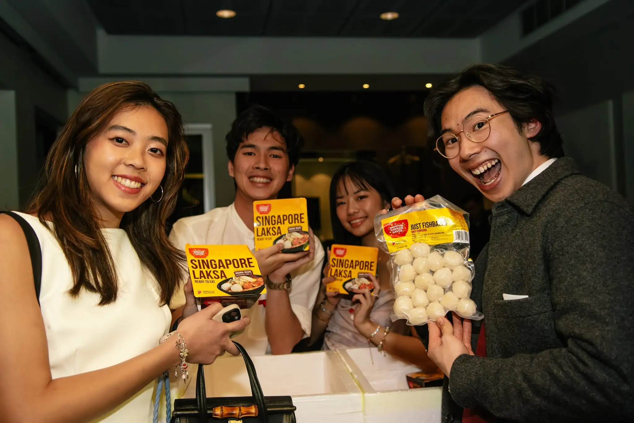 Monash University students with Singapore Hawker Haven foods during National Day celebrations.