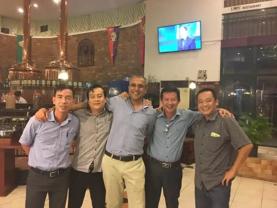Nikhil with former colleagues in Vietnam.